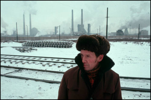 Man in railroad yard in Chelyabinsk during winter, Chelyabinsk, Russia