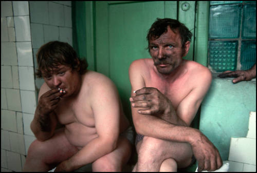 Two Miners Sit in a Shower Room after Their Shift, Novokuznetsk, Russia