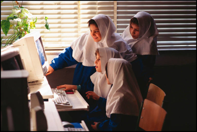 Iranian girls using a computer, Tehran