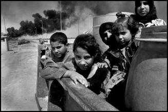 Displaced Iraqis during the war in Iraq near Basra, Iraq