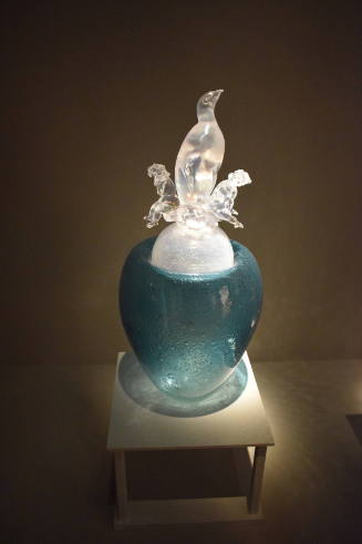 Opalescent Penguin with Two Putti